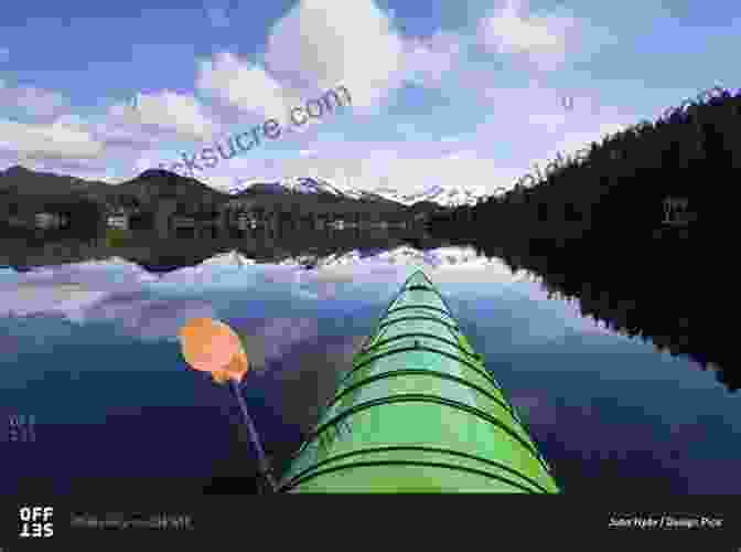 A Kayaker Paddling Through A Tranquil Alaskan Bay, Surrounded By Playful Sea Otters The Wild Side Of Alaska