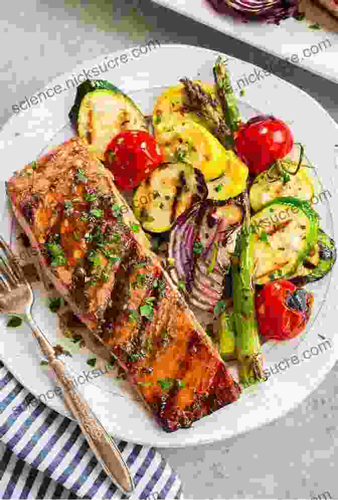 A Perfectly Grilled Salmon Fillet Served With An Array Of Colorful Roasted Vegetables Outdoor Griddle Cookbook : Healthy And Delicious Breakfast Lunch Dinners And Snakes Recipes Also More Recipes For All Ages